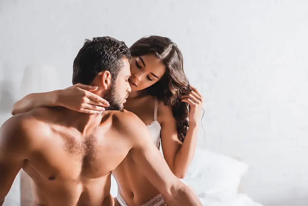 Man and woman on a bed